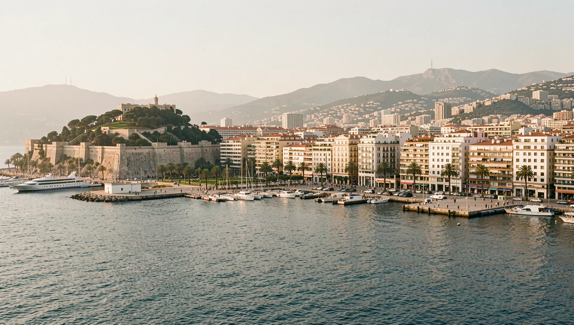 Barcelona, Spain, seen from the water at golden hour