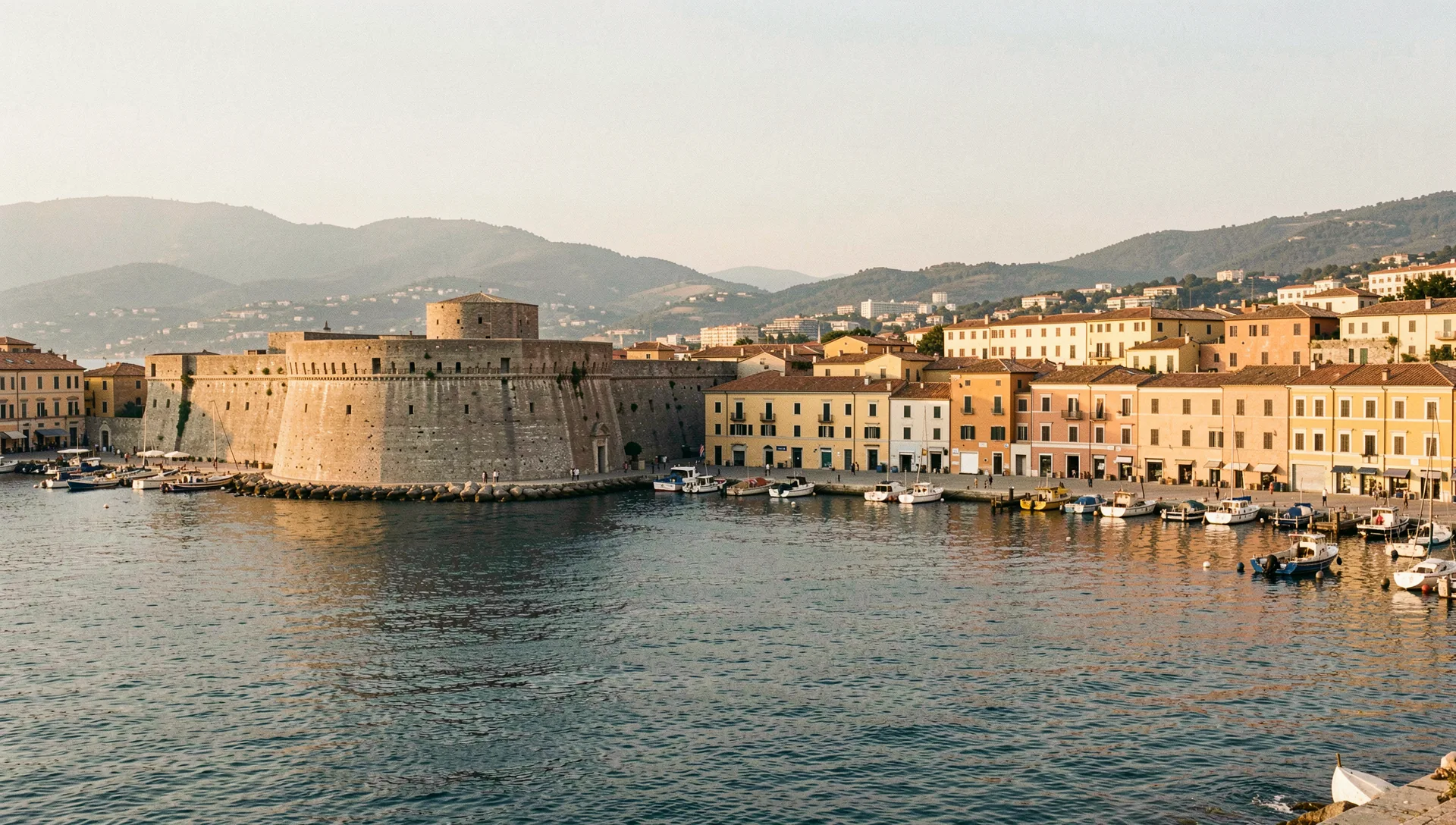 Civitavecchia, Italy, seen from the water at golden hour